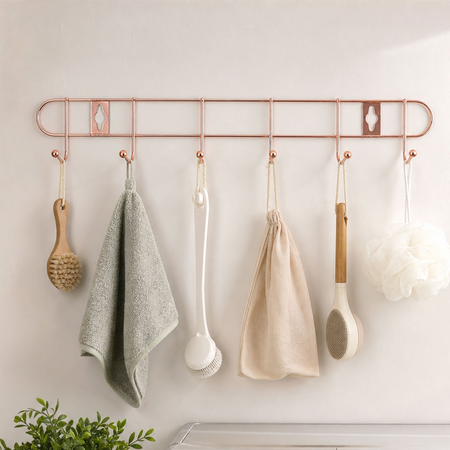 Wall mounted hook rail for towels and utensils