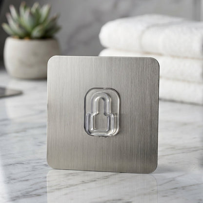 Plastic wall hook installed in bathroom for towels