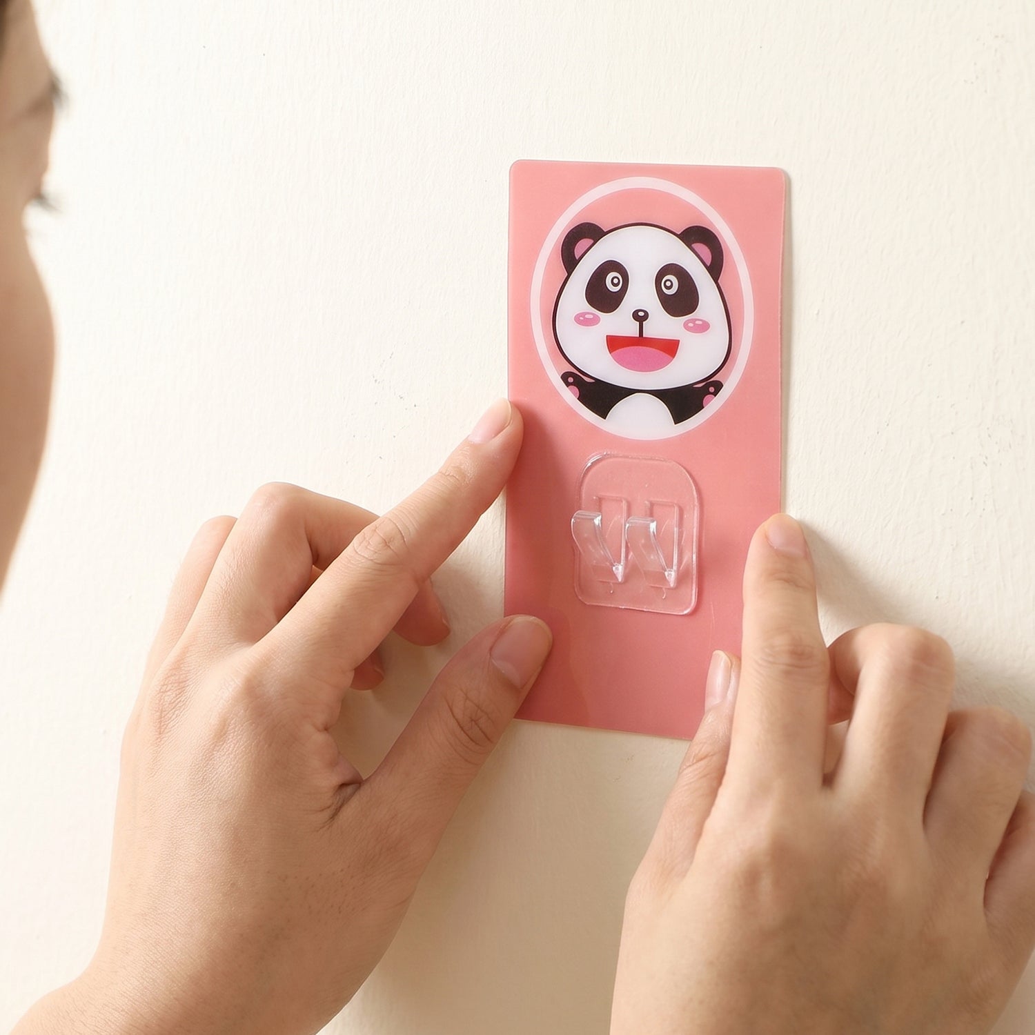 Kitchen storage solution using cartoon wall hook