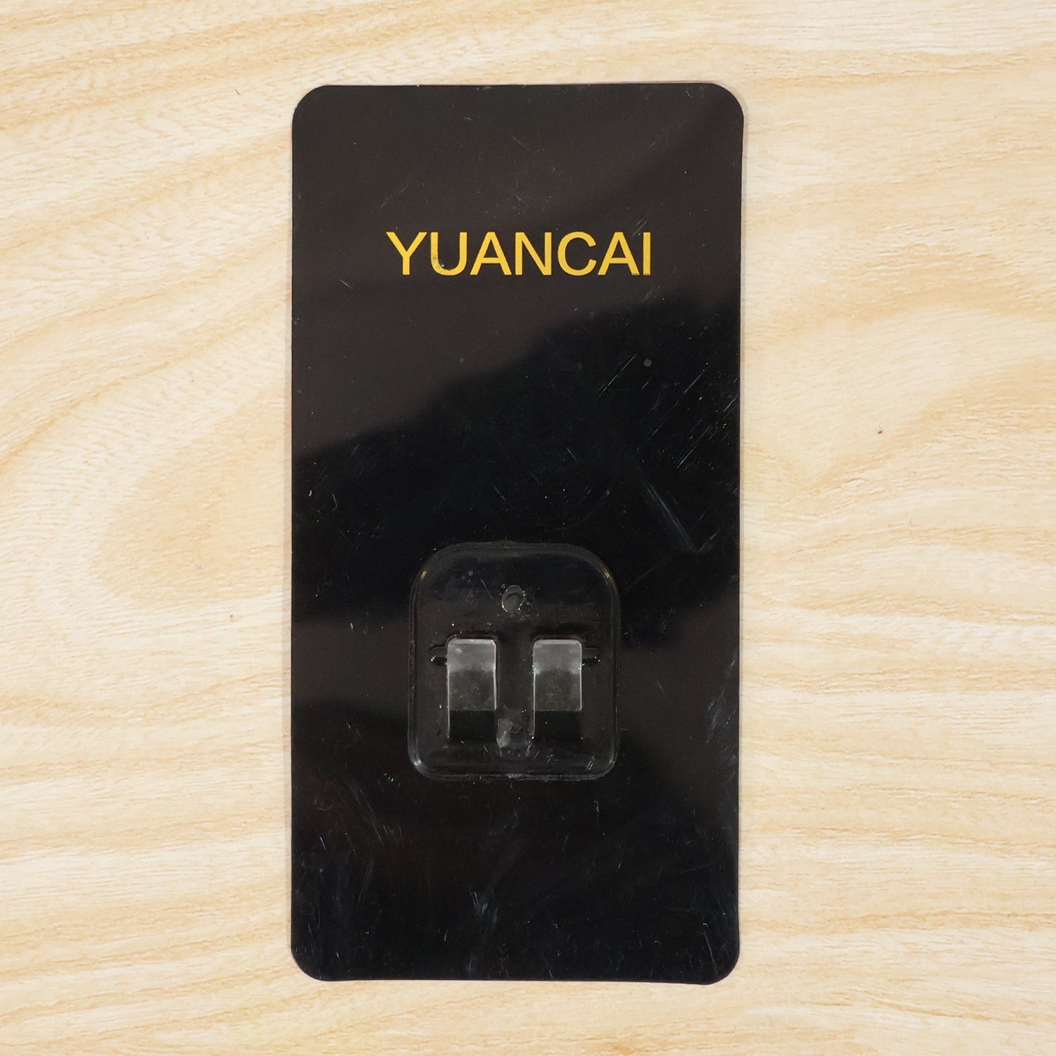 Adhesive wall hook for daily organization and storage